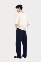 7115 By Szeki | Relaxed Curve Legged Trouser In Navy - SHOP YUCCA Pants 7115 BY SZEKI - YUCCA, Women’s clothing store Denver, women’s clothing website, women’s elevated pants, clothing boutiques near me, women’s elevated trousers.