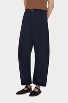 7115 By Szeki | Relaxed Curve Legged Trouser In Navy - SHOP YUCCA Pants 7115 BY SZEKI - YUCCA, Women’s clothing store Denver, women’s clothing website, women’s elevated pants, clothing boutiques near me, women’s elevated trousers.