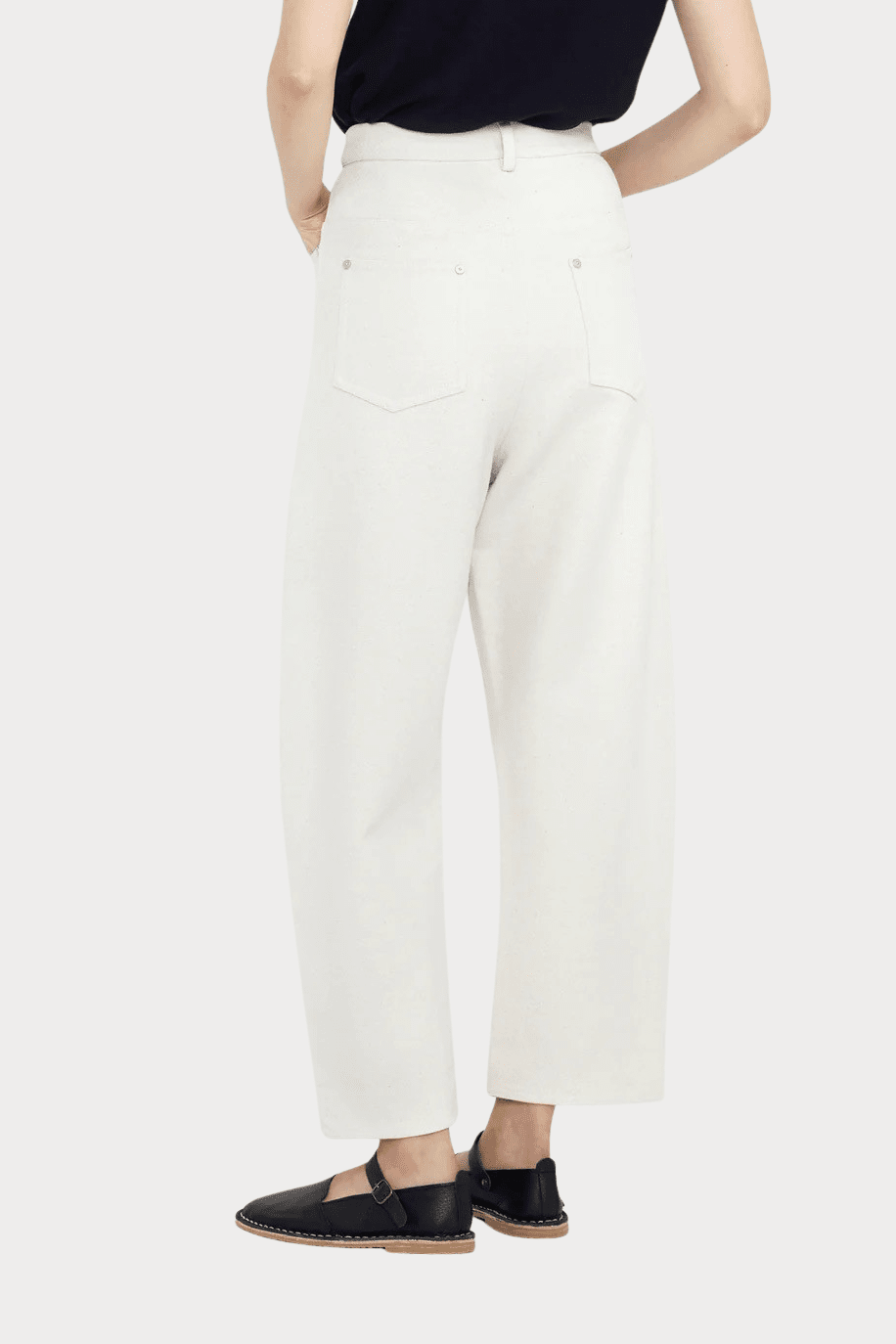 7115 By Szeki | Relaxed Curve Legged Trouser In Off-White - SHOP YUCCA Pants 7115 BY SZEKI - YUCCA, Women’s clothing store Denver, women’s clothing website, women’s elevated pants, clothing boutiques near me, women’s elevated trousers.