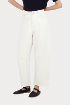 7115 By Szeki | Relaxed Curve Legged Trouser In Off-White - SHOP YUCCA Pants 7115 BY SZEKI - YUCCA, Women’s clothing store Denver, women’s clothing website, women’s elevated pants, clothing boutiques near me, women’s elevated trousers.