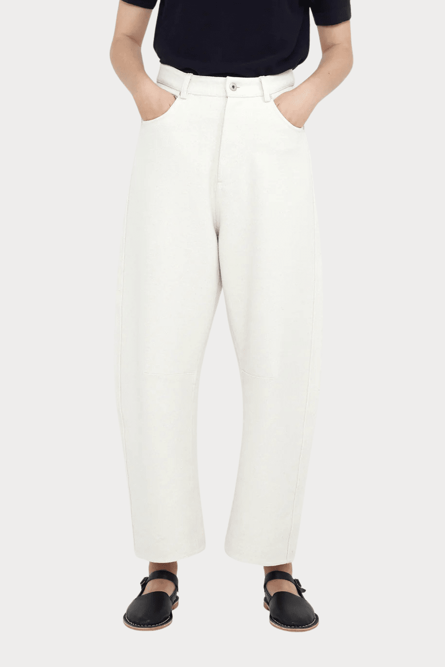 7115 By Szeki | Relaxed Curve Legged Trouser In Off-White - SHOP YUCCA Pants 7115 BY SZEKI - YUCCA, Women’s clothing store Denver, women’s clothing website, women’s elevated pants, clothing boutiques near me, women’s elevated trousers.