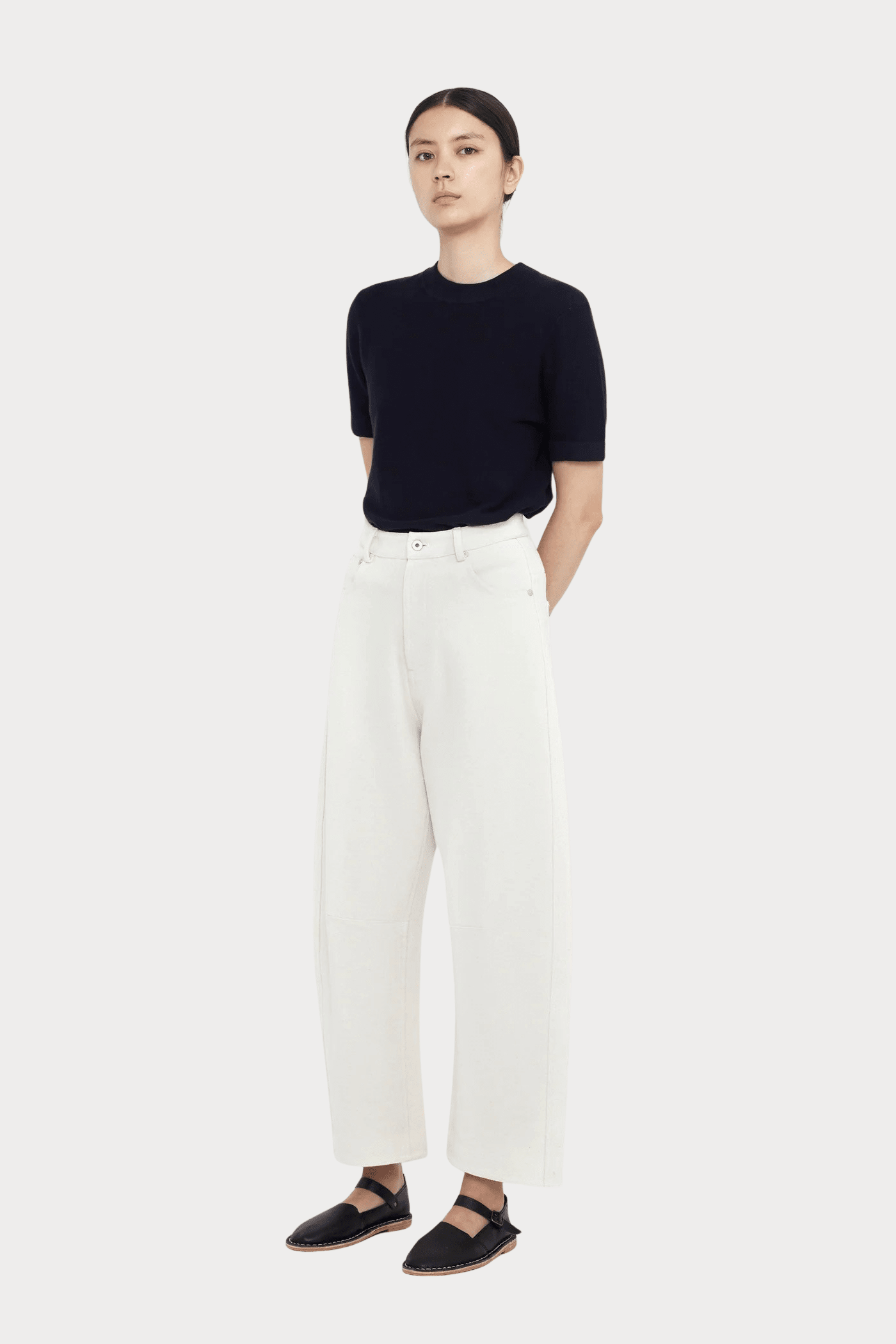 7115 By Szeki | Relaxed Curve Legged Trouser In Off-White - SHOP YUCCA Pants 7115 BY SZEKI - YUCCA, Women’s clothing store Denver, women’s clothing website, women’s elevated pants, clothing boutiques near me, women’s elevated trousers.