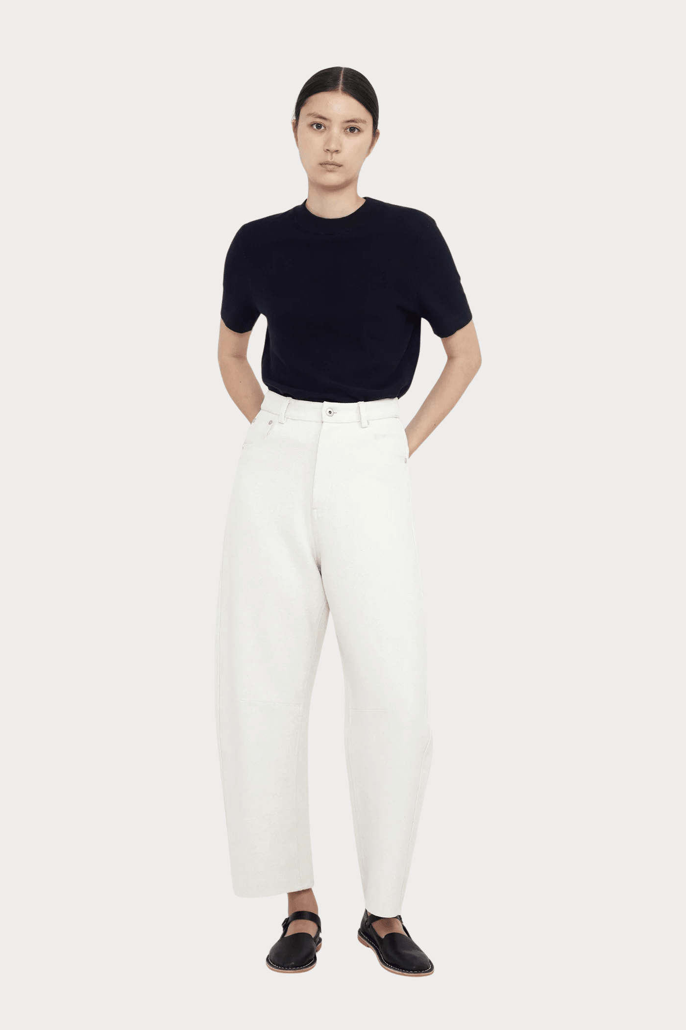 7115 By Szeki | Relaxed Curve Legged Trouser In Off-White - SHOP YUCCA Pants 7115 BY SZEKI - YUCCA, Women’s clothing store Denver, women’s clothing website, women’s elevated pants, clothing boutiques near me, women’s elevated trousers.