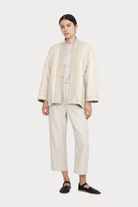 7115 By Szeki | Reversible Quilted Jacket In Oatmeal - SHOP YUCCA Coats & Jackets 7115 BY SZEKI - YUCCA, Women’s clothing store Denver, women’s clothing website, women’s high quality jackets, women’s high quality coats, women’s high quality outerwear.