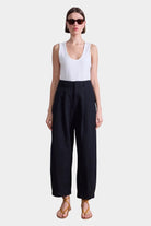 Apiece Apart | Bari Crop Trousers In Black - SHOP YUCCA Pants APIECE APART - YUCCA, Women’s clothing store Denver, women’s clothing website, women’s elevated pants, clothing boutiques near me, women’s elevated trousers.