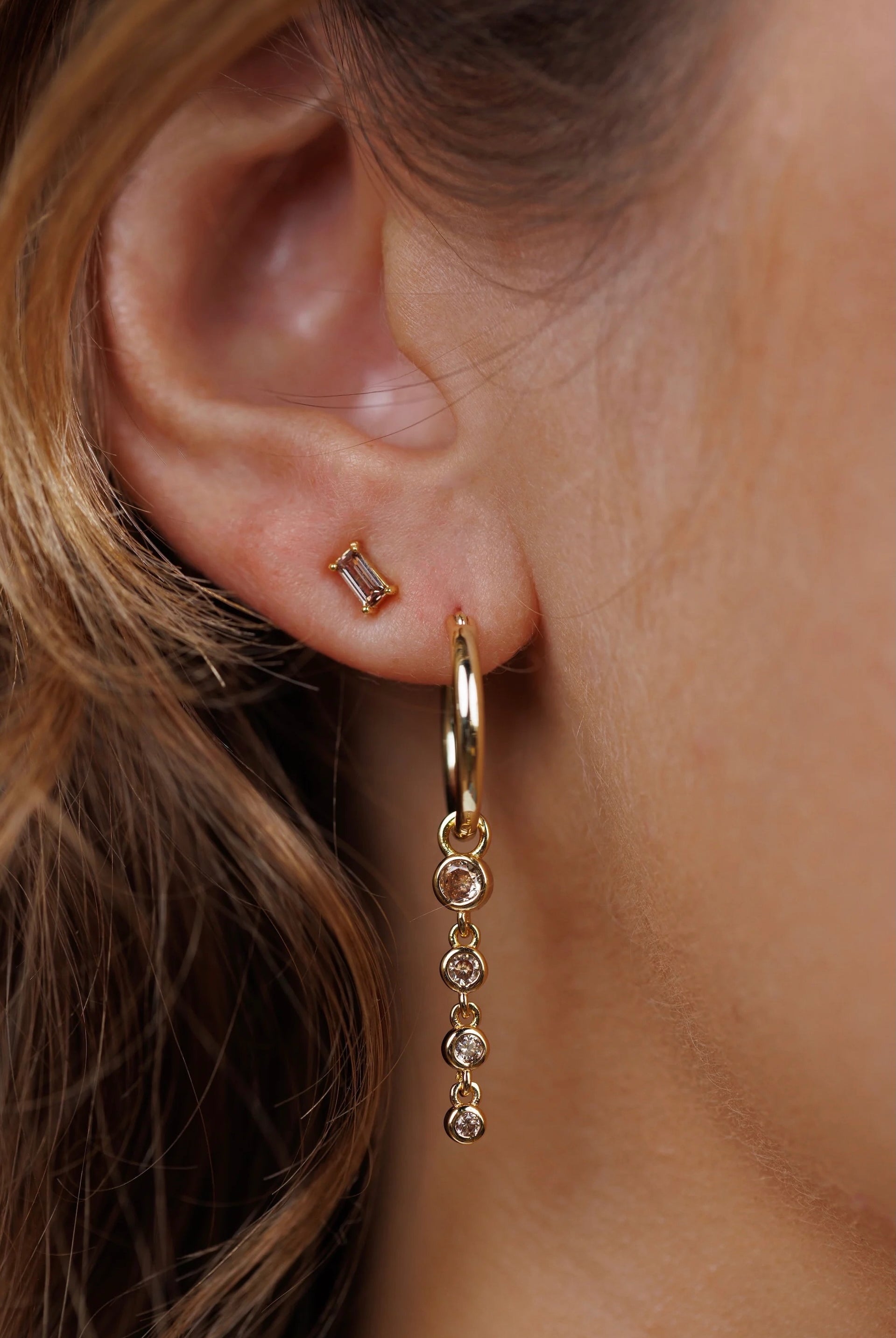Earrings - YUCCA, coffee colored baguette CZ stud earrings with gold plating and sterling silver posts.