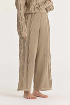 Black Crane | Cable Knit Pants In Taupe - SHOP YUCCA Shirts & Tops BLACK CRANE - YUCCA, Women’s clothing store Denver, women’s clothing website, women’s elevated pants, clothing boutiques near me, women’s elevated trousers.