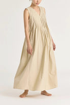 Black Crane | Pleated V Neck Dress In Oyster - SHOP YUCCA Dress BLACK CRANE - YUCCA, artistic clothing for women, Women’s clothing store Denver, boutique stores near me, capsule wardrobe, women’s elevated basics.