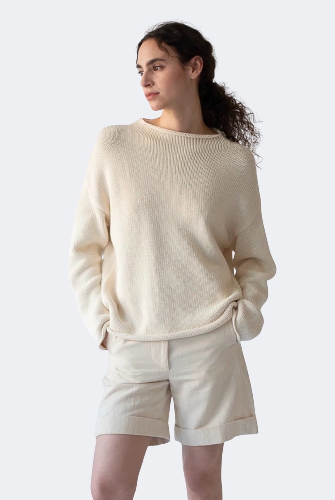 Close view of DEMYLEE Lamis off white cotton sweater showing textured knit and rolled hem detail