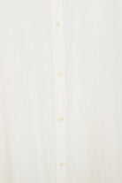 Ichi Antiquités | Linen Dungaree Dress In White - SHOP YUCCA Dresses ICHI ANTIQUITÉS - YUCCA, artistic clothing for women, Women’s clothing store Denver, boutique stores near me, capsule wardrobe, women’s elevated basics.