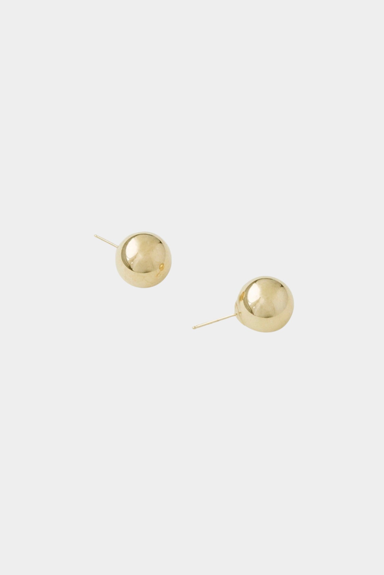 Medium polished gold sphere stud earrings with post backing.