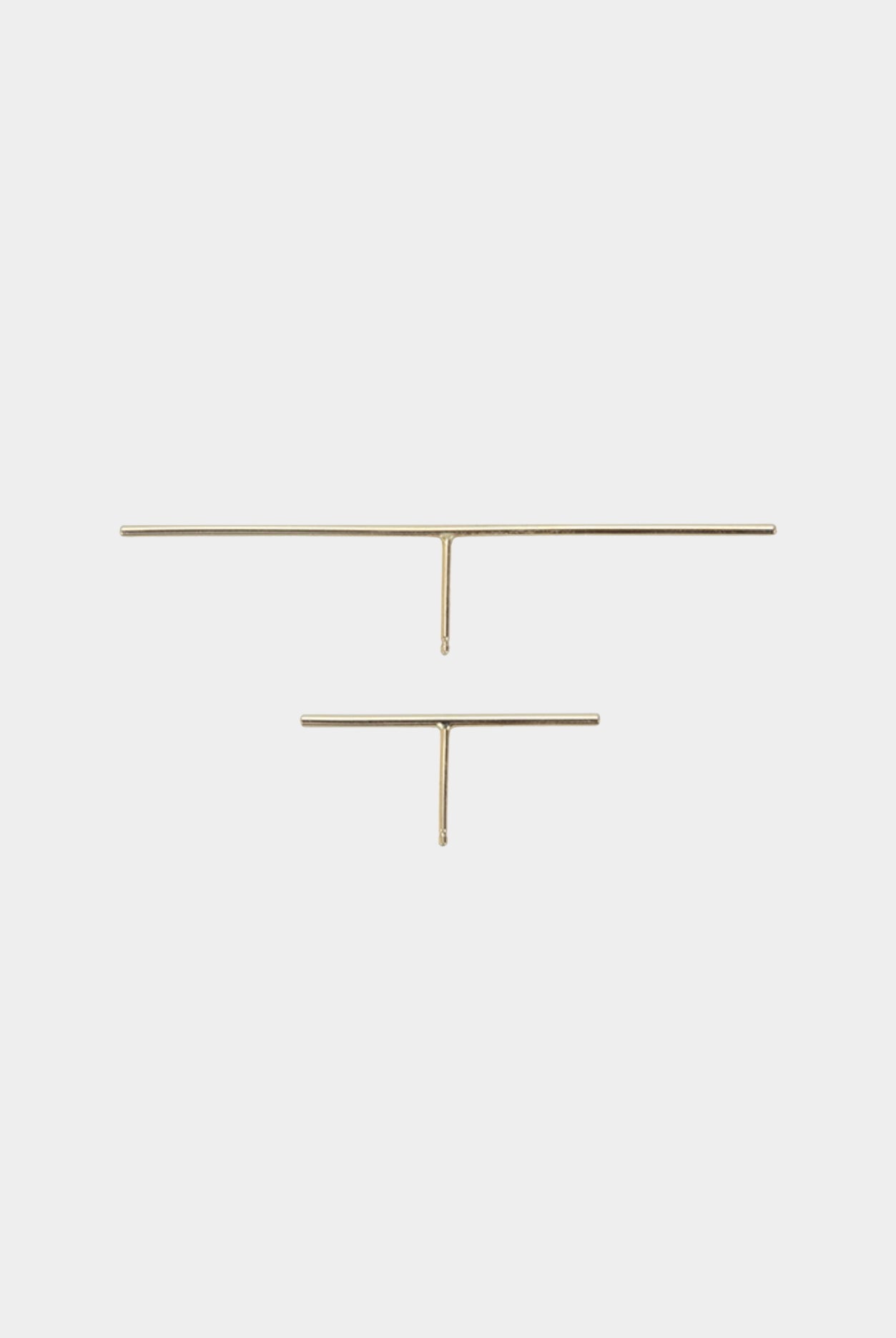 14K gold bar stud earrings with polished finish and post backing.