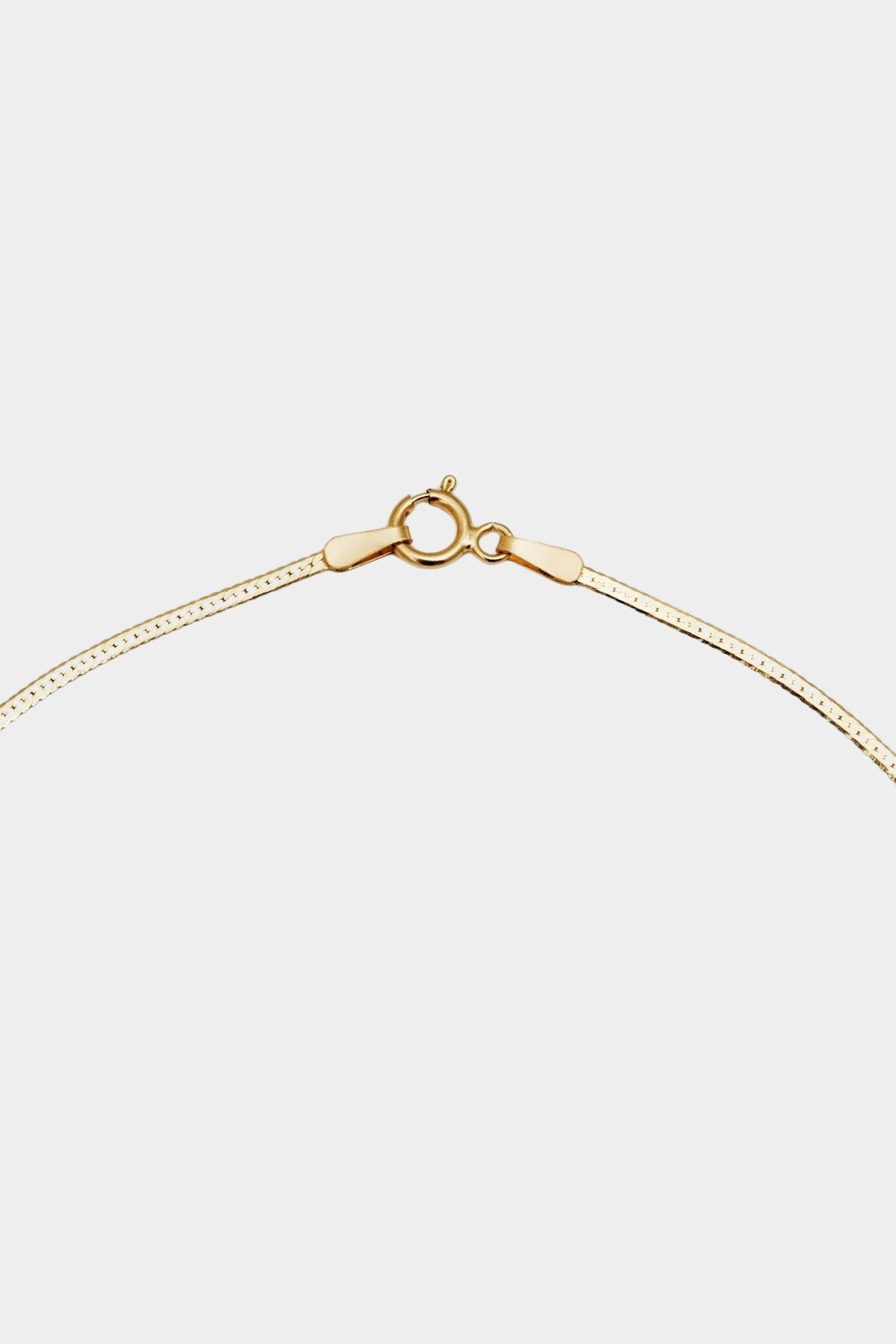 10K gold herringbone necklace with secure clasp closure detail.