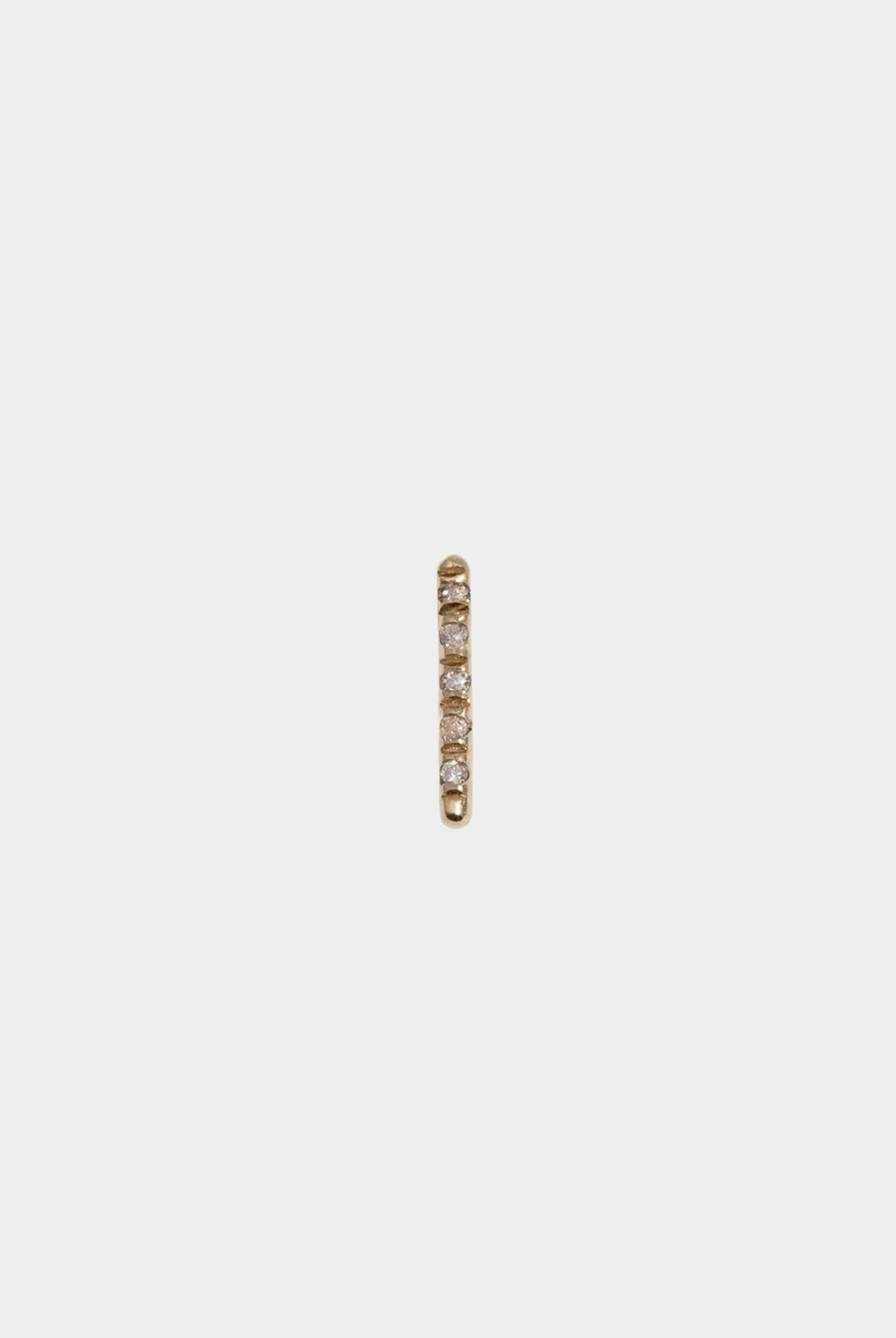 14K gold diamond bar stud earring with pavé diamond detail.