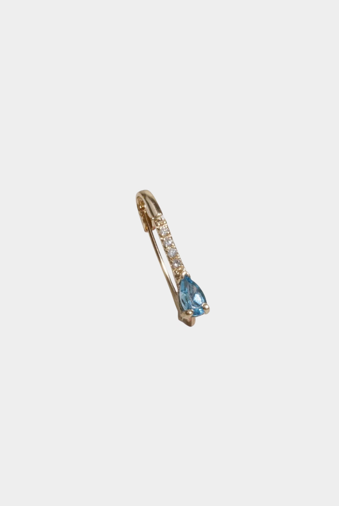 14K gold pear blue topaz and diamond drop hoop earring.