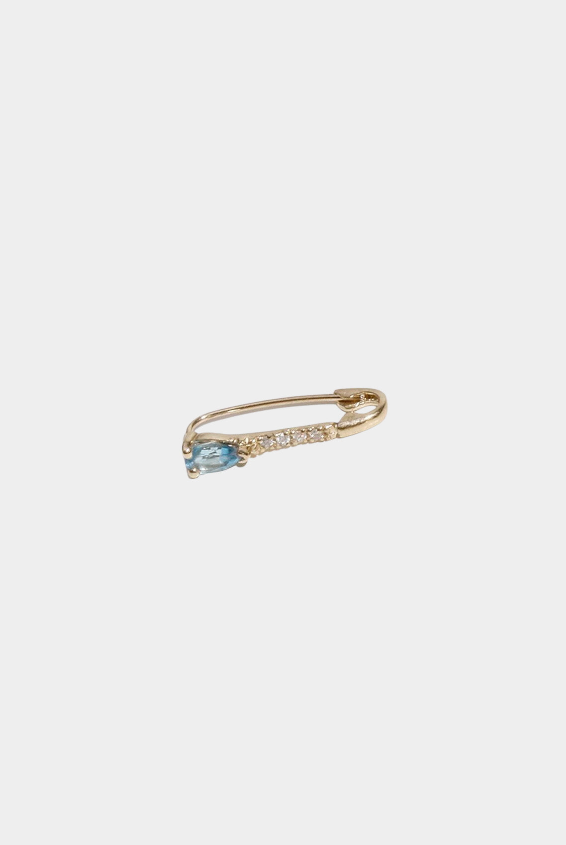 14K gold diamond hoop earring with pear-cut blue topaz.