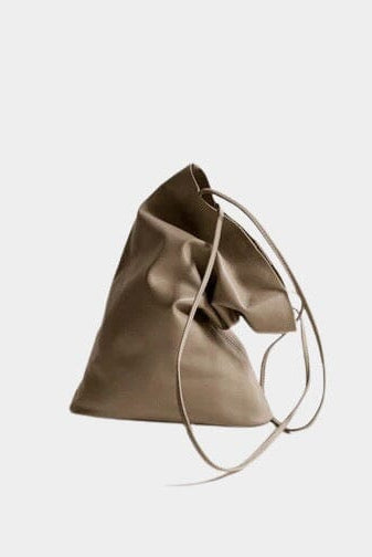 Modern Weaving | Slim Elongated Tote In Taupe - SHOP YUCCA Handbags MODERN WEAVING - YUCCA, Women’s clothing store Denver, women’s high quality bags, women’s online leather bags, minimalist leather bags.