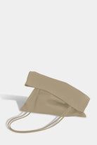 Modern Weaving | Slim Lamb Sak In Taupe - SHOP YUCCA Handbags MODERN WEAVING - YUCCA, Women’s clothing store Denver, women’s high quality bags, women’s online leather bags, minimalist leather bags.