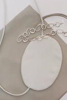 Modern Weaving | Slim Lamb Sak In Taupe - SHOP YUCCA Handbags MODERN WEAVING - YUCCA, Women’s clothing store Denver, women’s high quality bags, women’s online leather bags, minimalist leather bags.