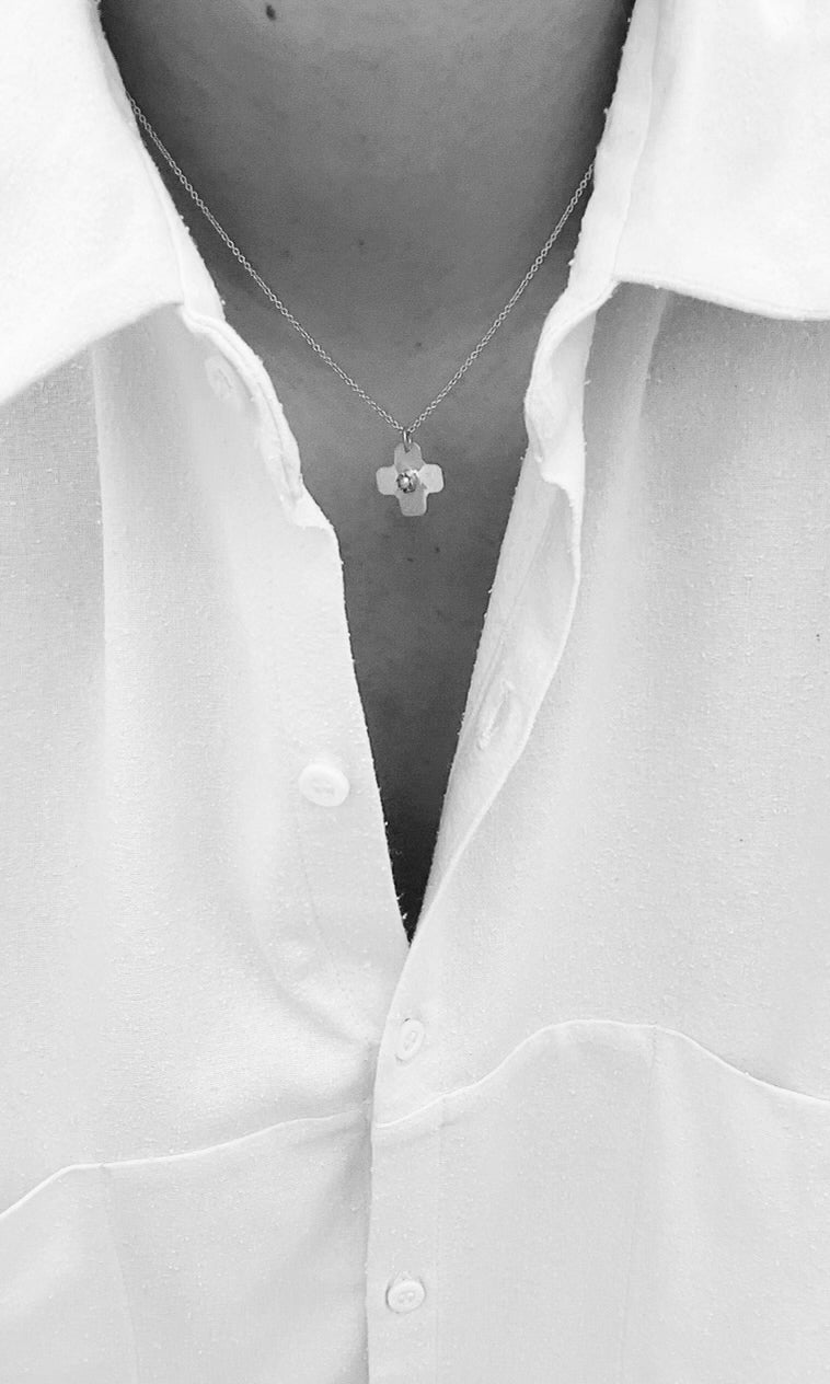 Après Ski gold charm necklaces and sculptural pendants at YUCCA Denver boutique