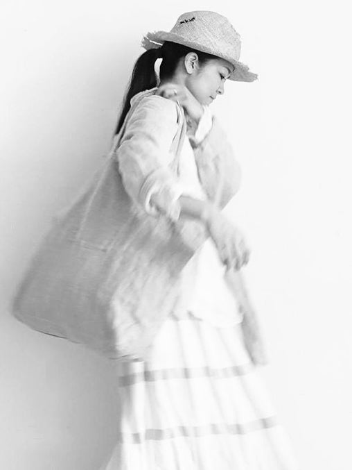 Black and white portrait of woman wearing Ichi Antiquités natural linen clothing