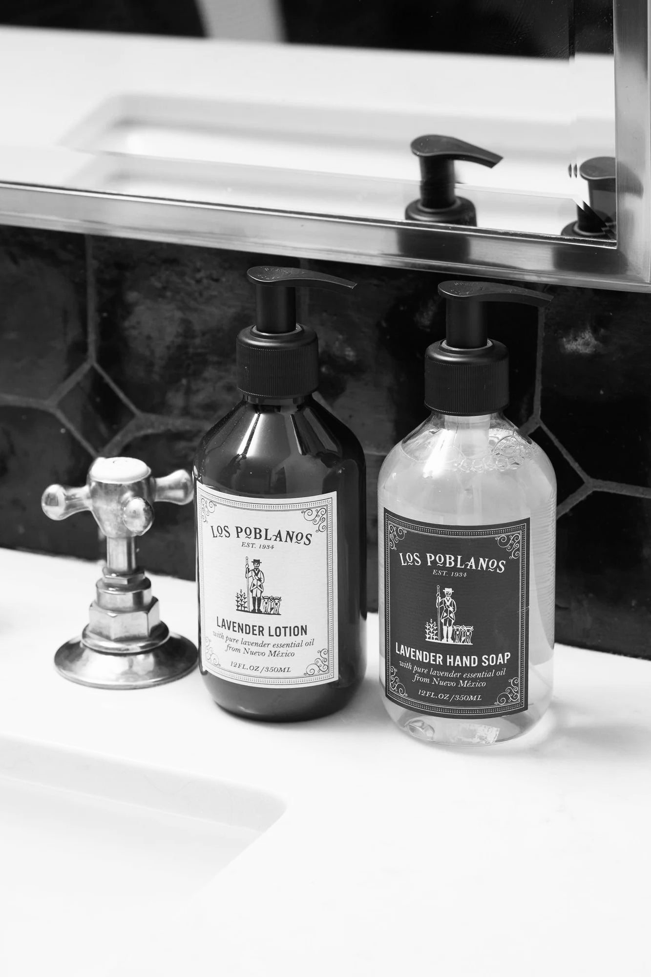 Los Poblanos Lavender Lotion and Lavender Hand Soap styled in modern bathroom sink setting for YUCCA Face & Body collection