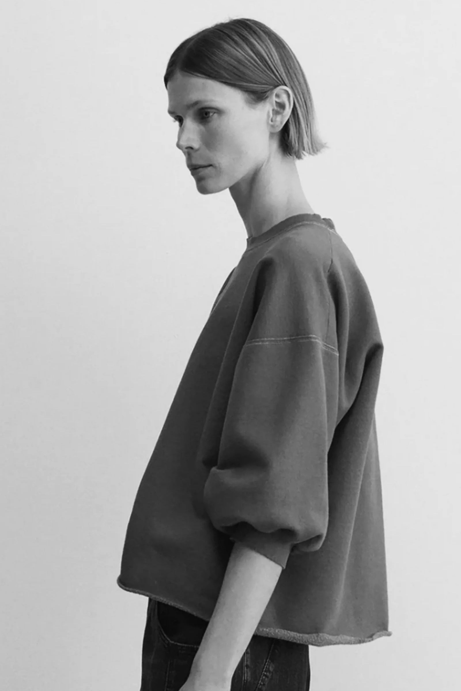 Woman wearing a relaxed cropped sweatshirt in a soft casual fit