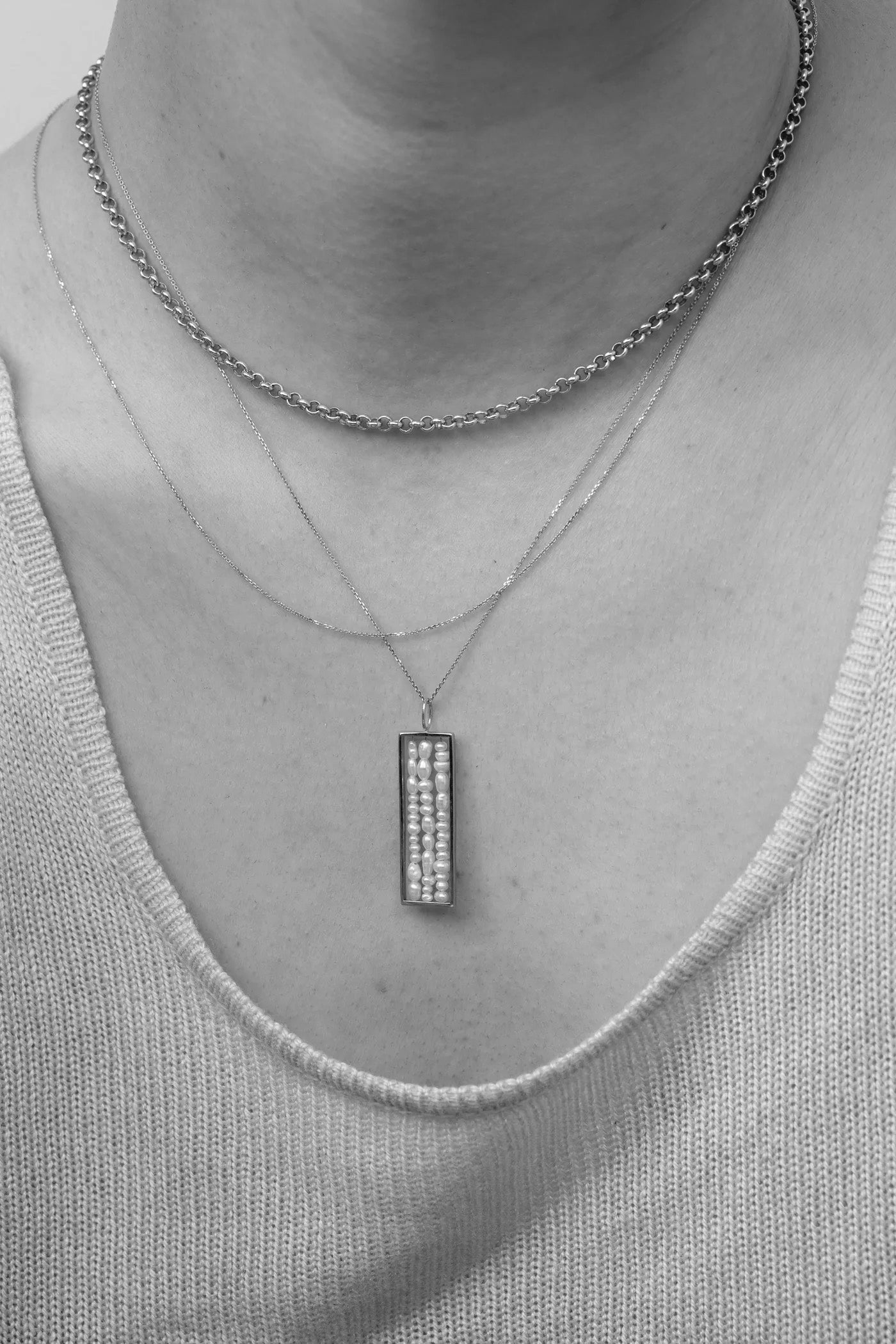 WWAKE 14k recycled gold opal and diamond fine jewelry layered necklace styled on model at YUCCA Denver