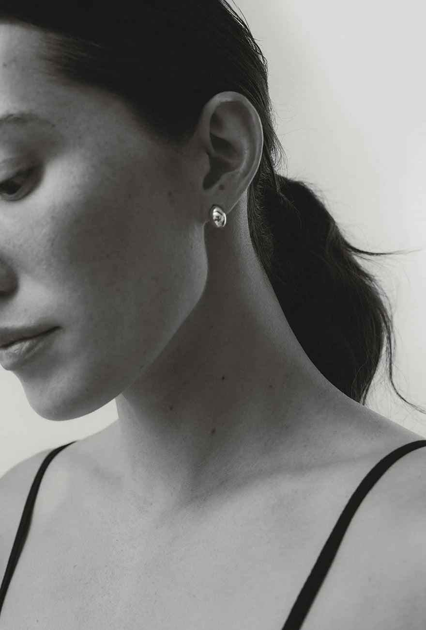 Women’s designer earrings at YUCCA Denver – modern studs, hoops, and pearl earrings from independent jewelry designers