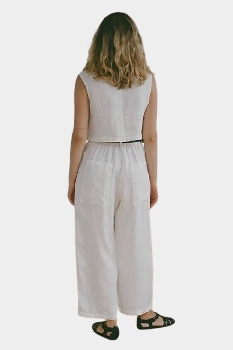 Shaina Mote Paradis trouser in natural organic cotton, rear full length with relaxed straight leg and cropped hem