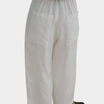 Shaina Mote Paradis trouser in natural organic cotton, back view showing elastic waistband and patch pockets