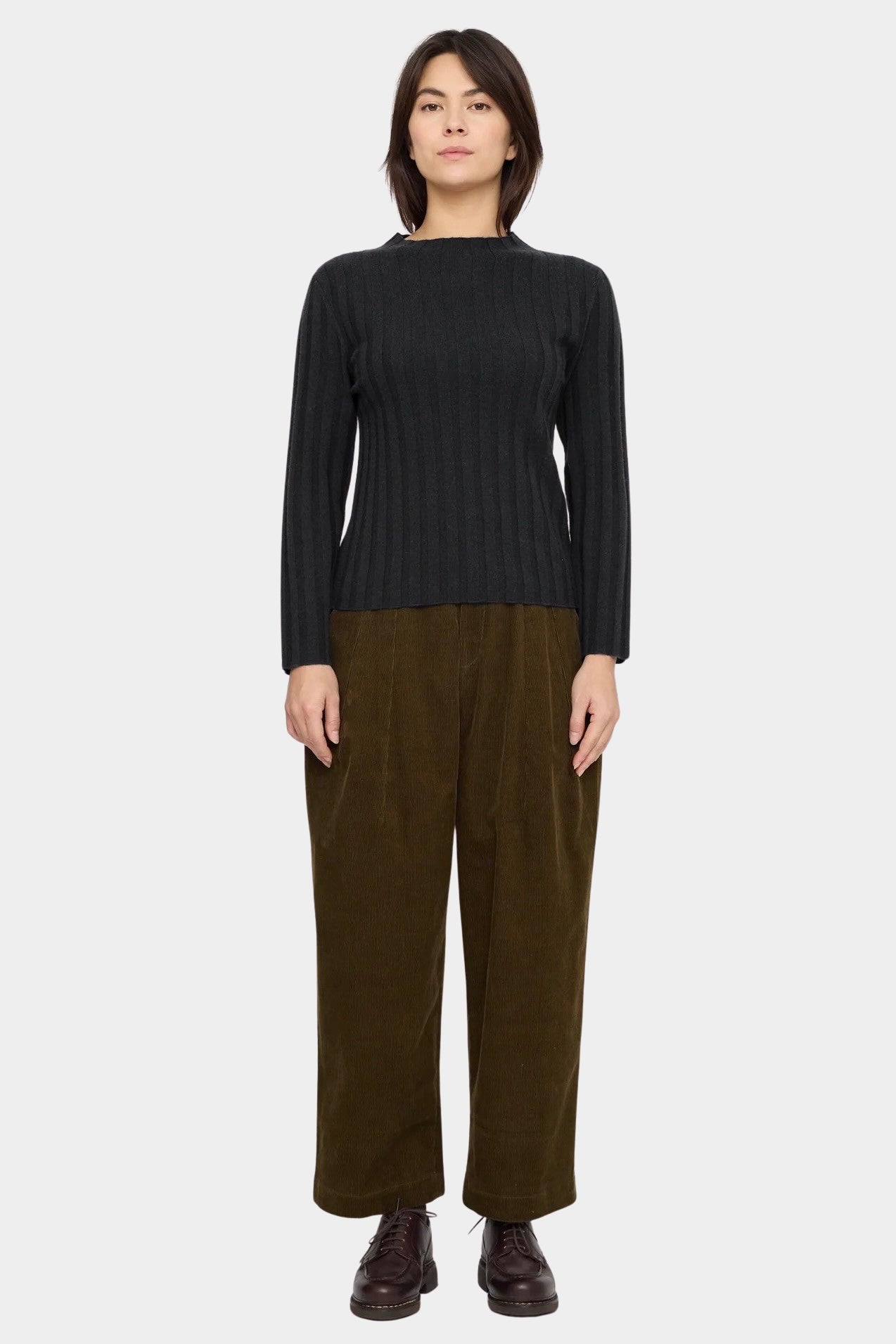 7115 by Szeki Mock Neck Ribbed Long Sleeves Charcoal front view showing the full untucked silhouette at YUCCA Denver.