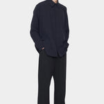 7115 by Szeki Signature Curve Legged Trouser Canvas Edition black curved leg trousers angle view