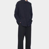 7115 by Szeki Signature Curve Legged Trouser Canvas Edition black curved leg trousers angle view