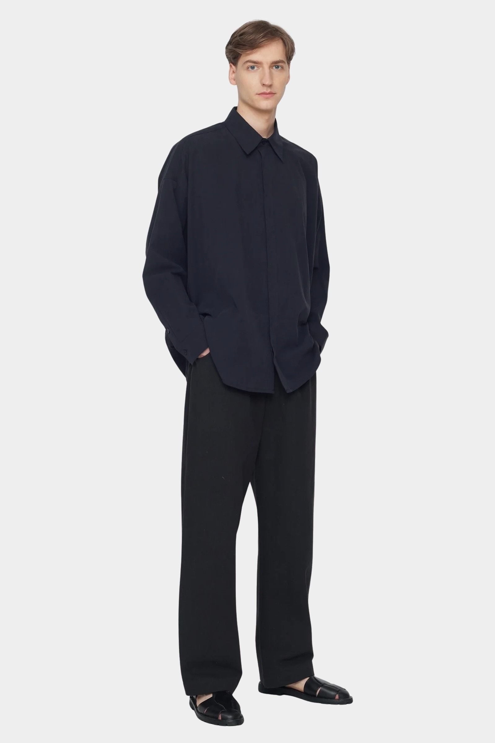 7115 by Szeki Signature Curve Legged Trouser Canvas Edition black curved leg trousers angle view