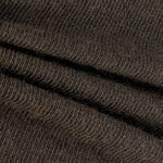 Amomento Turtle T-Shirt in Brown neckline close-up, showing soft folds and fine jersey texture