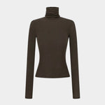 Macro detail of the Amomento Turtle T-Shirt in Brown, showing the knit stitches and softly brushed fibers
