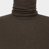 Three-quarter view of the Amomento Turtle T-Shirt in Brown, showing the fitted body and long sleeves