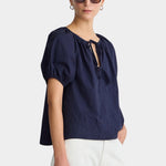 Midnight navy tie top side view puff sleeves relaxed silhouette breathable cotton poplin blouse
