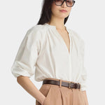 Apiece Apart Do Cisneros Top Cream organic cotton blouse three-quarter side view