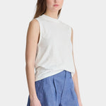 Apiece Apart Forte Tee Cream angled front view styled with chambray shorts and elevated wardrobe staple silhouette