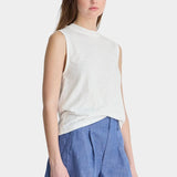 Apiece Apart Forte Tee Cream angled front view styled with chambray shorts and elevated wardrobe staple silhouette