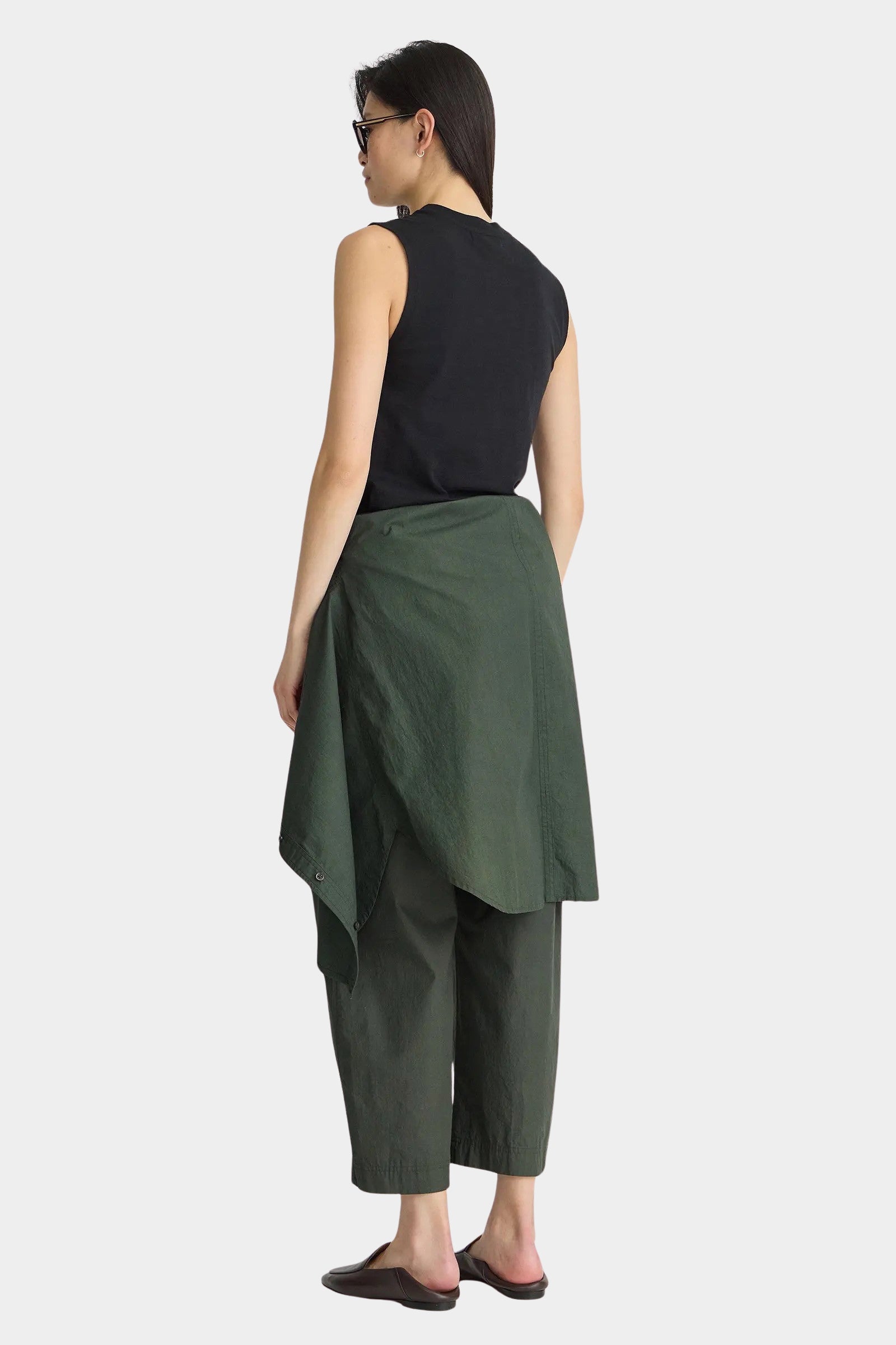Apiece Apart Forte Tee Black sleeveless top back view styled with wide leg pants