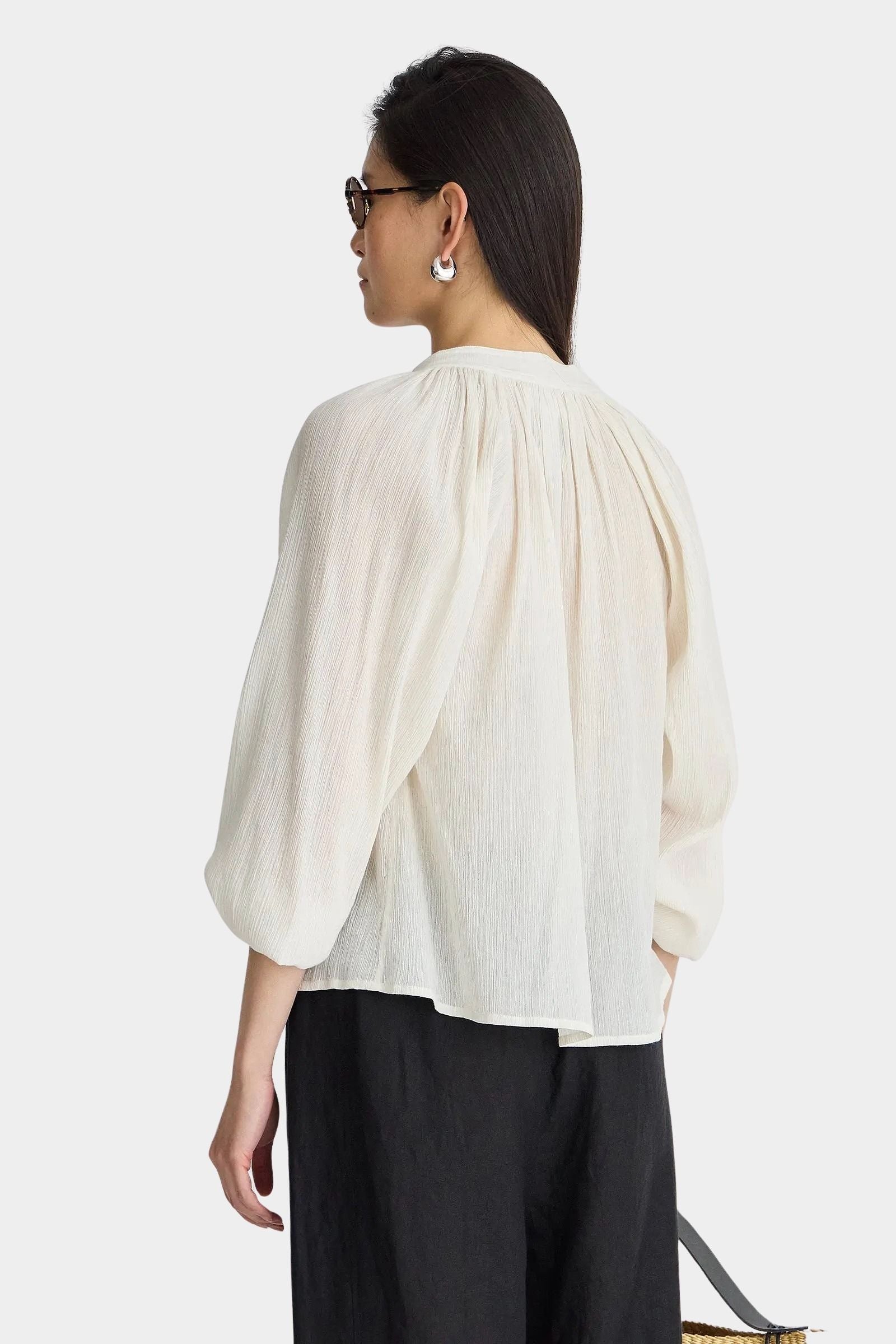 Back view of Apiece Apart Lo Campo Shirt Cream with gathered detailing and relaxed drape