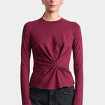 Apiece Apart Long Sleeve Volta Top in Black Cherry with twist front detail styled with black trousers at YUCCA Denver