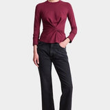Apiece Apart Long Sleeve Volta Top in Black Cherry with twist front detail styled with black trousers at YUCCA Denver