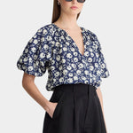 Navy floral lantern sleeve top side view relaxed silhouette gathered shoulders breathable cotton voile blouse