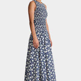 Midnight navy smocked maxi dress side view sleeveless crew neckline lightweight cotton flowy A-line skirt