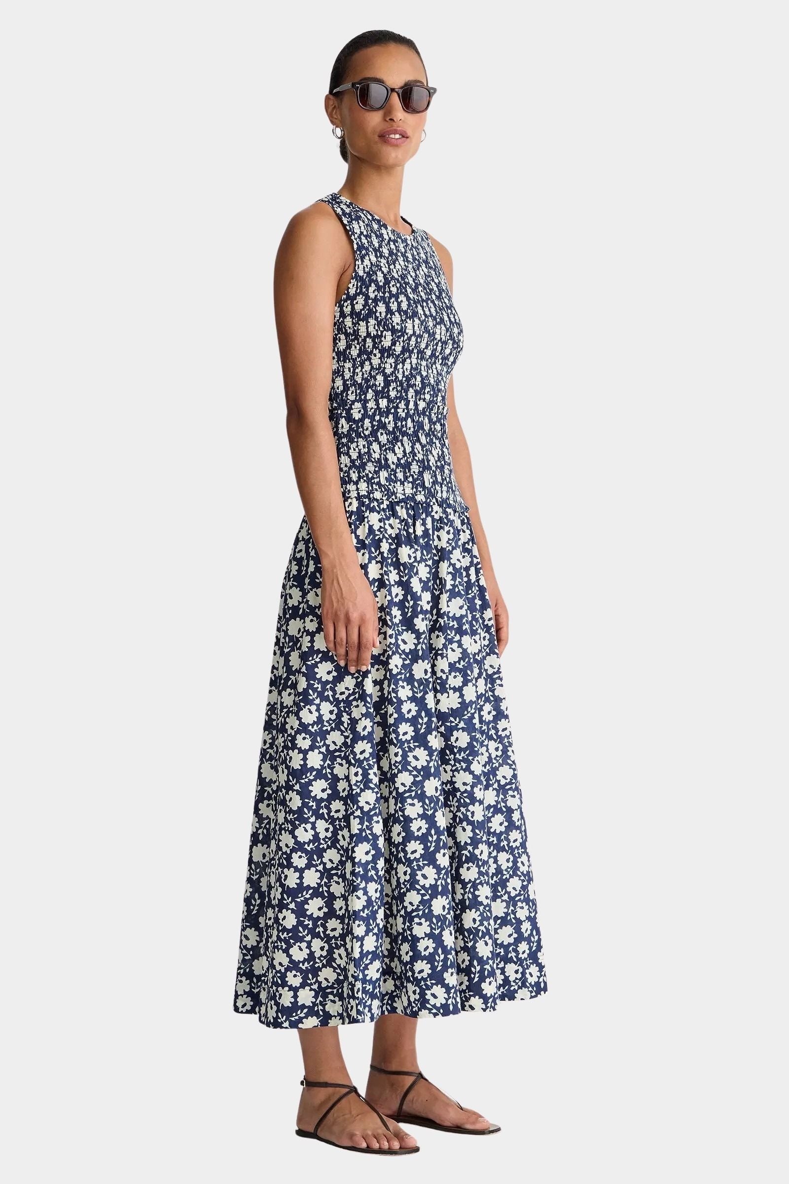 Midnight navy smocked maxi dress side view sleeveless crew neckline lightweight cotton flowy A-line skirt