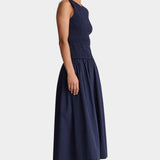 Midnight navy smocked maxi dress side view sleeveless crew neckline lightweight cotton flowy A-line skirt